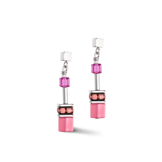 A steel pair of earrings with bright pink cube shaped stones and glass beads