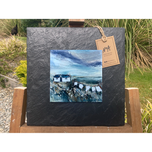 Slate mounted ceramic tile art featuring a painting of a white cottage and washing line