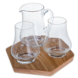 Set of two whisky glasses and a jug and a hexagonal wooden tray