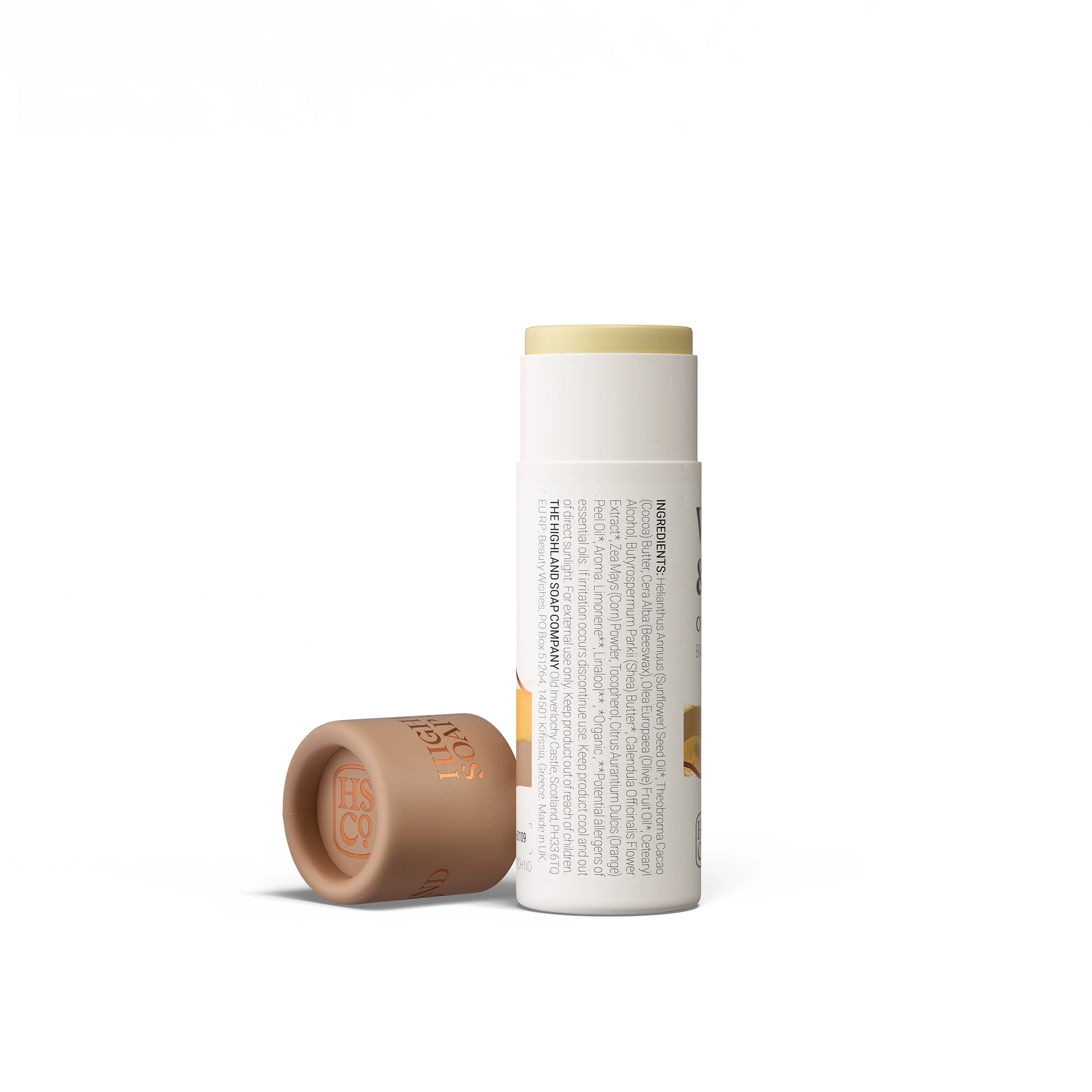 Highland Soap Co. whisky and honey flavour organic lip balm in compostable tube packaging with ingredient list
