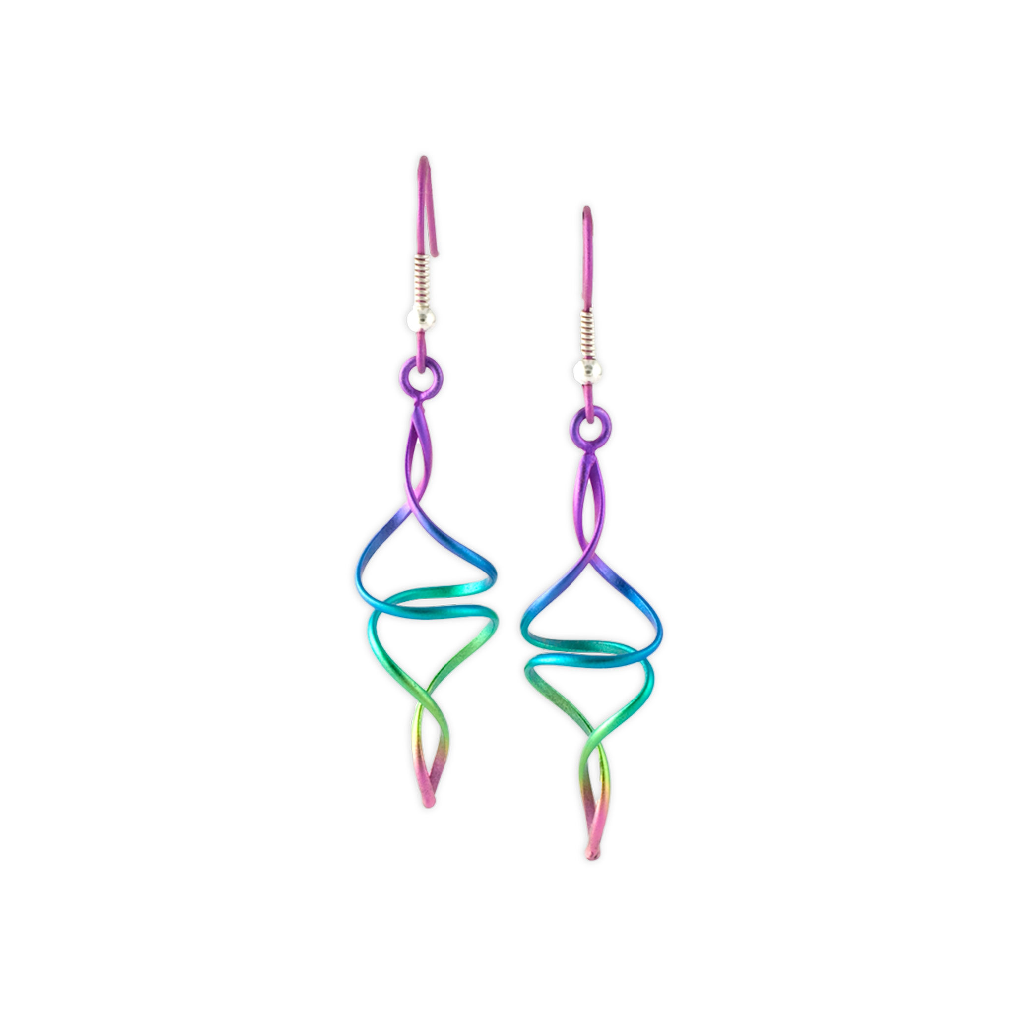 A pair of looping twist wire titanium drop earrings in rainbow ombre