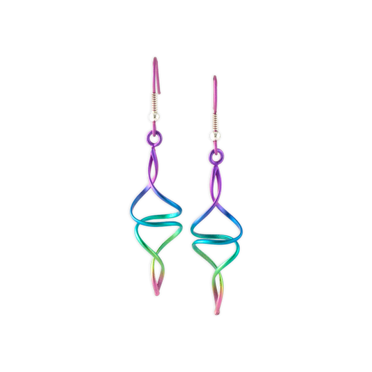 A pair of looping twist wire titanium drop earrings in rainbow ombre