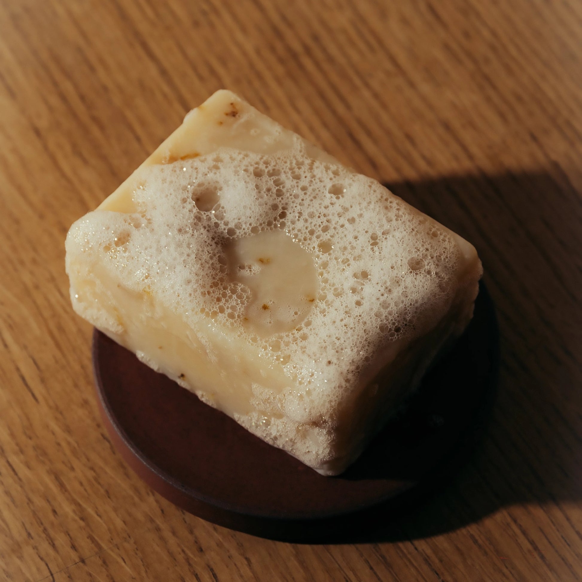 Highland Soap Co. wild gorse and vanilla scented soap bar lathered