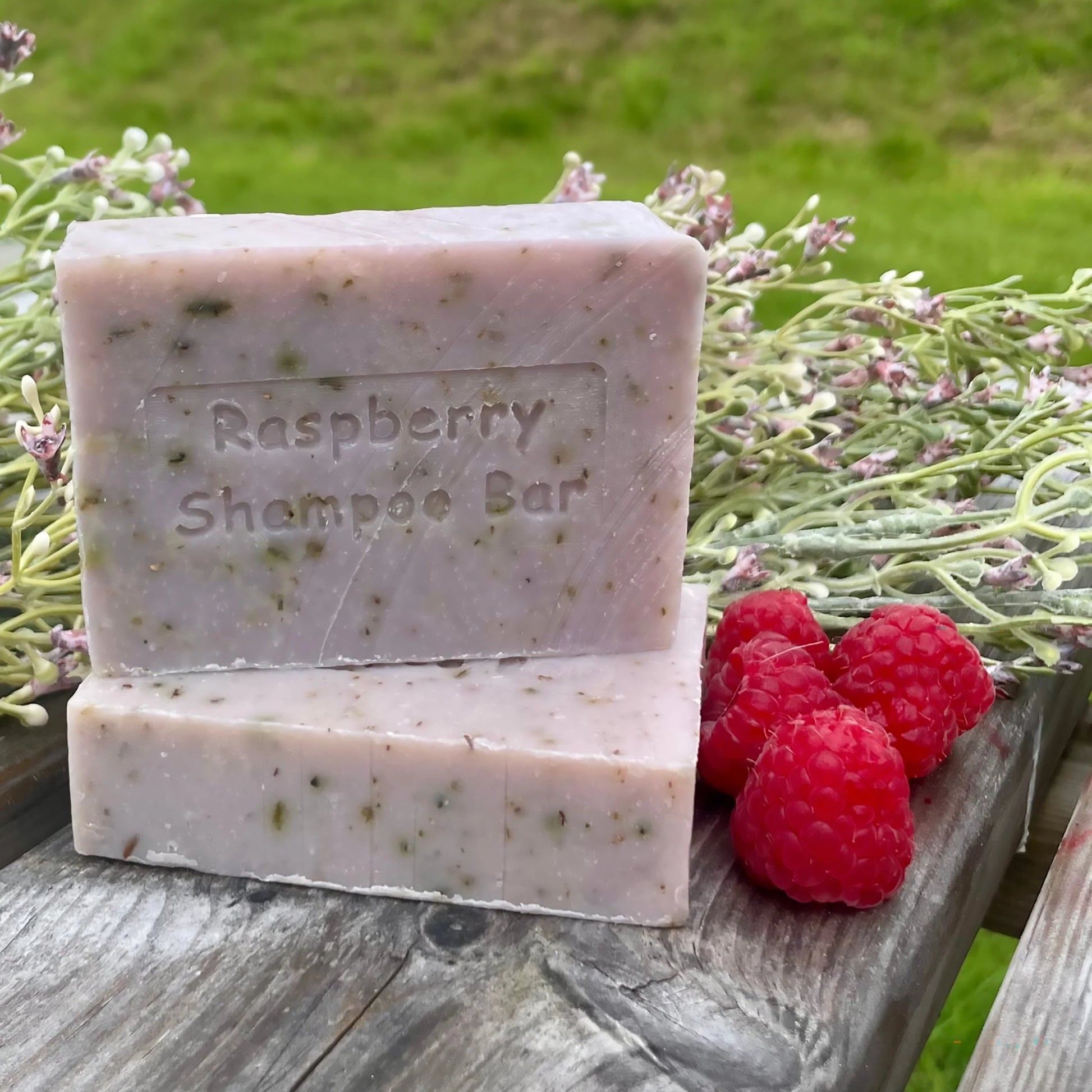 Bars of wild Scottish raspberry shampoo by The Highland Soap Co. lifestyle