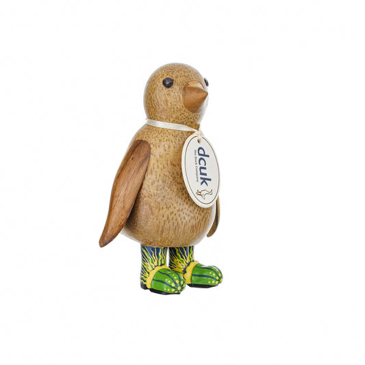 A wooden penguin wearing wellies with green jellyfish design