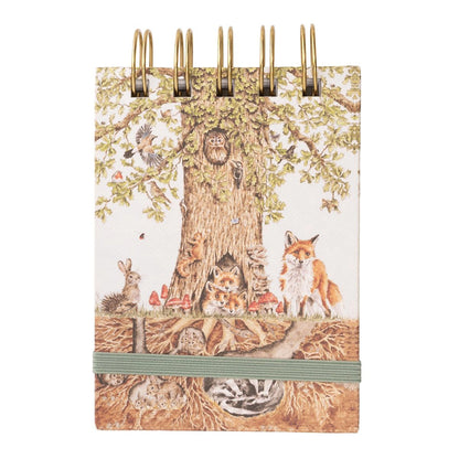 Ring bound notebook with tree and wildlife illustration and green elastic closure