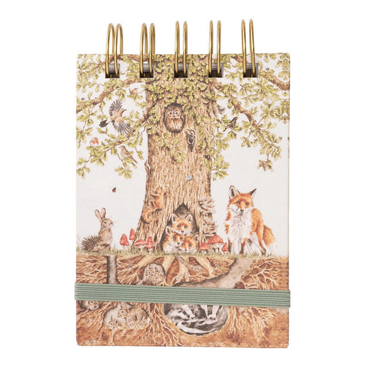Ring bound notebook with tree and wildlife illustration and green elastic closure