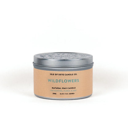 A travel tin candle in the scent wildflowers