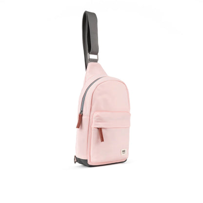 Pale pink crossbody sling bag with grey nylon strap 2
