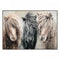 Framed canvas of three ponies in a row with an impressionist grey background of foliage.