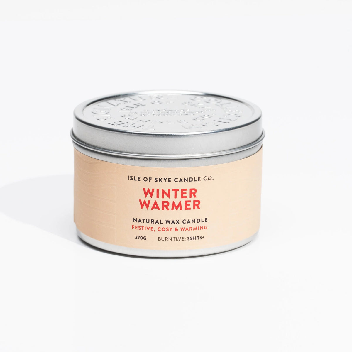 A travel tin candle in the scent winter warmer by Isle of Skye Candle Co.