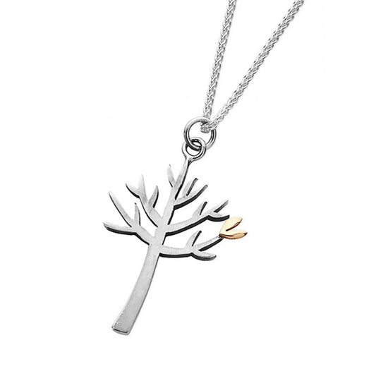 Silver pendant in illustrative tree shape with little golden heart detail, on a silver chain