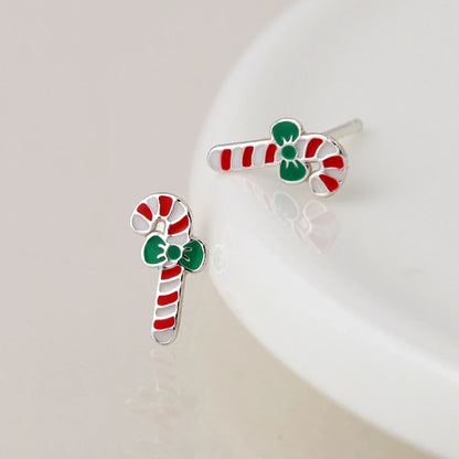 Pair of silver stud earrings shaped like candy canes with enamelled details