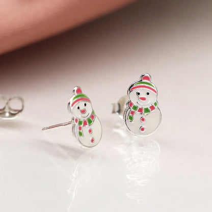 Pair of silver stud earrings shaped like snowmen with enamelled details