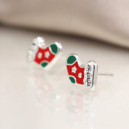 Pair of silver stud earrings shaped like stockings with enamelled details