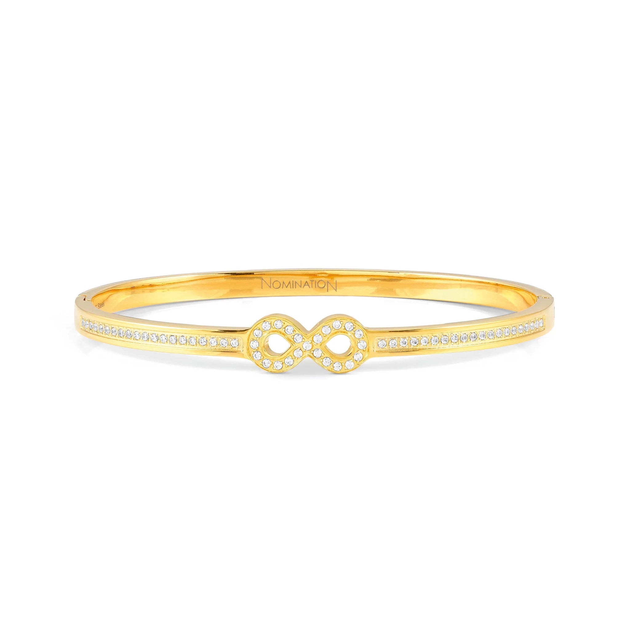 A yellow gold bangle with infinity symbol and cubic zirconia stones