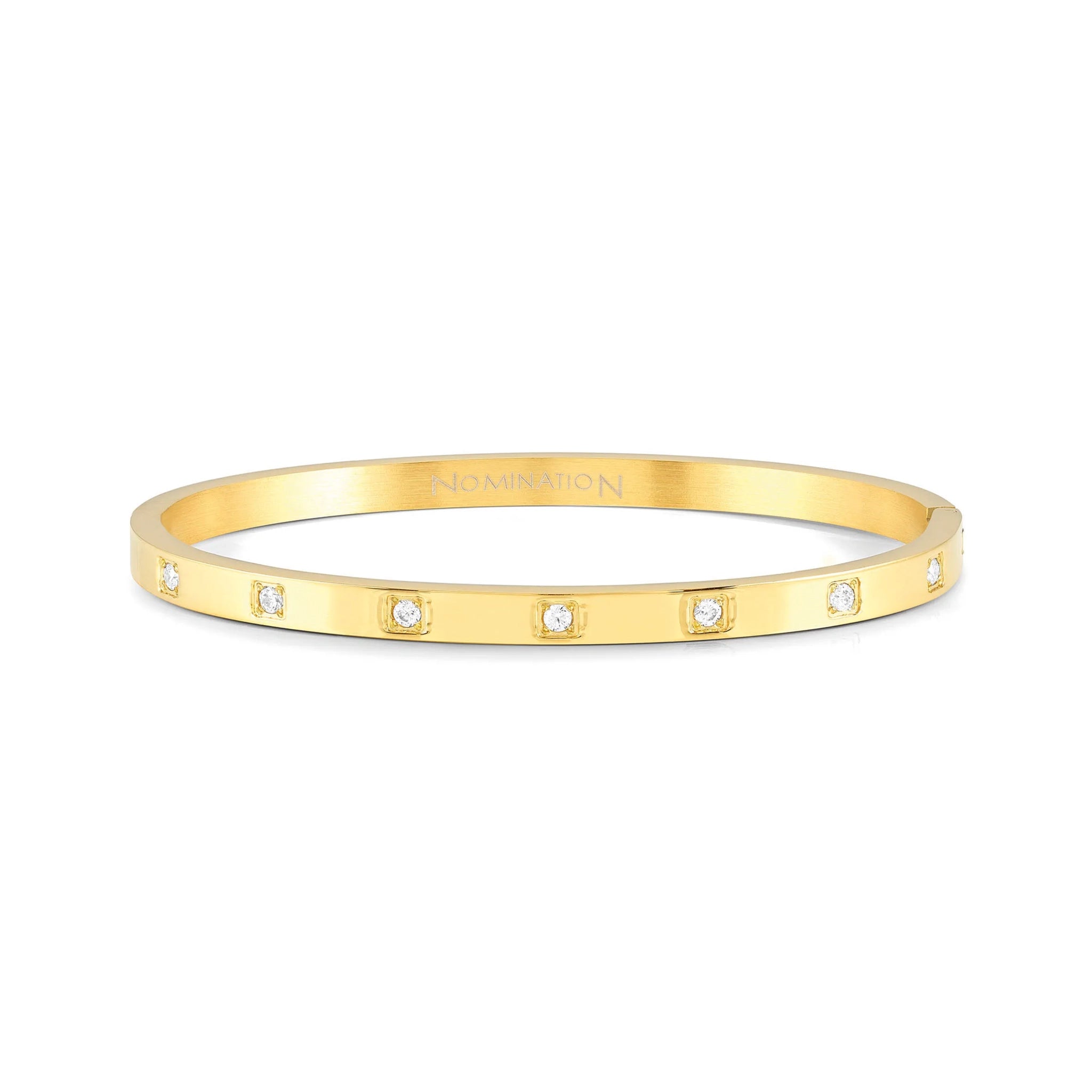 A yellow gold simple bangle with evenly spaced CZ stones in engraved squares