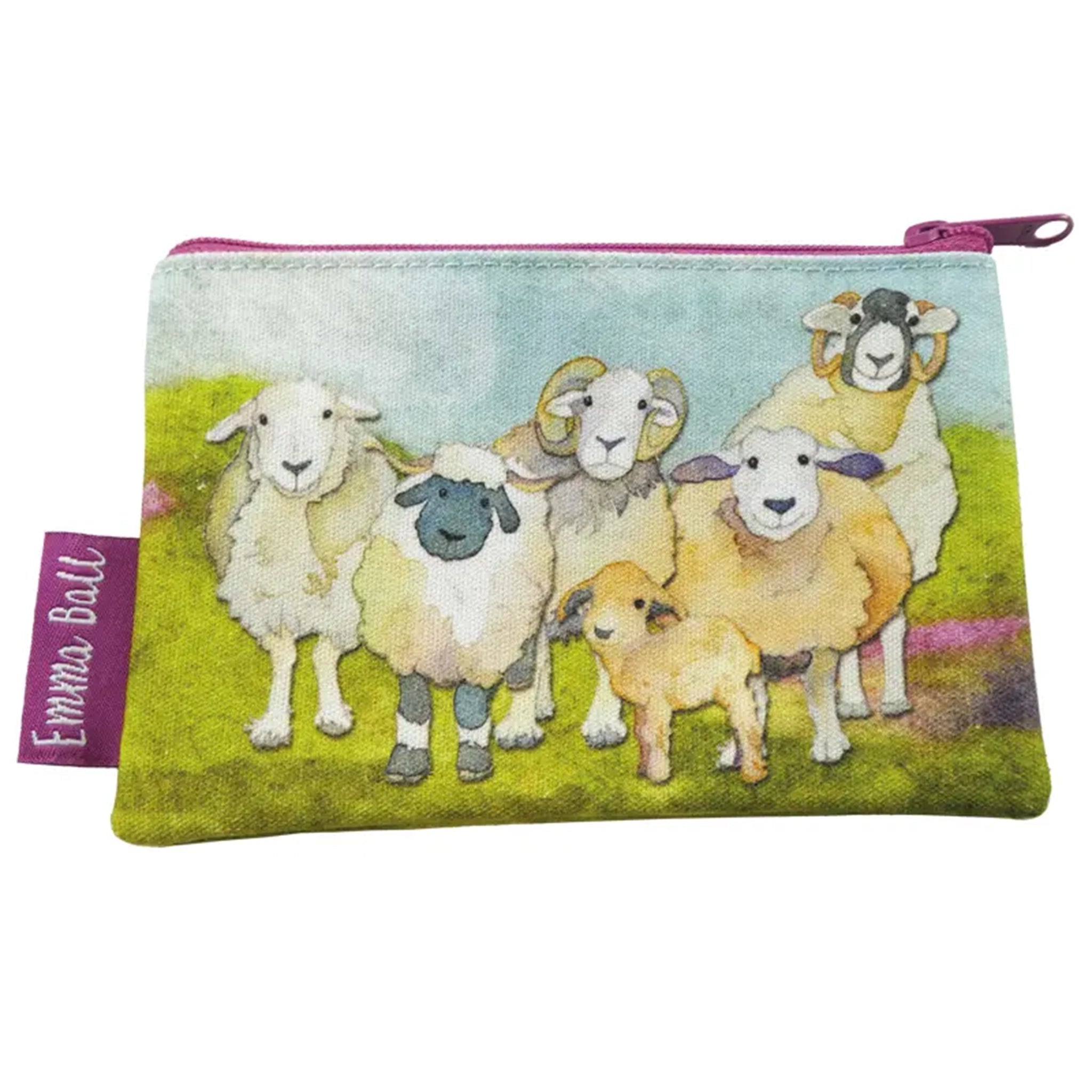 A zip purse with a printed illustration of sheep on a felted style landscape 