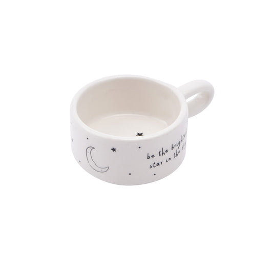  White mug shaped ceramic tealight holder with handle and star pattern, with the phrase 'Be the brightest star in the sky'