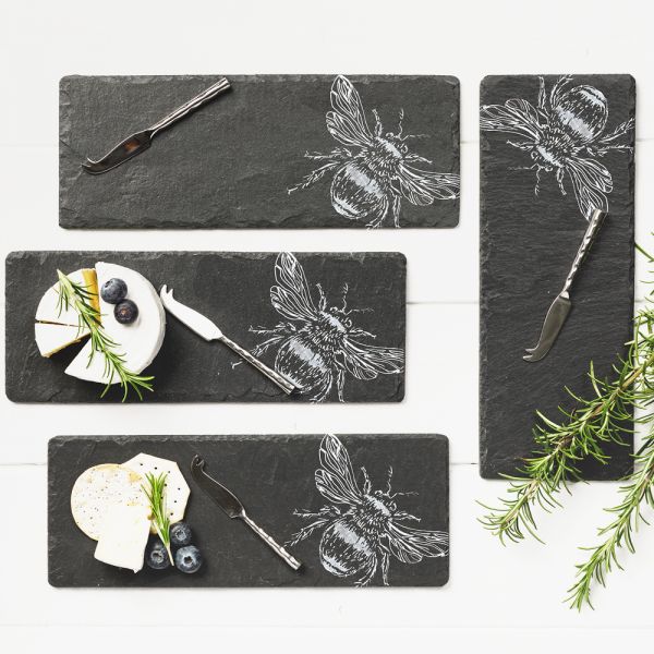 Set of four slate cheeseboards with etched bees and four cheese knives. 30cm by 20cm